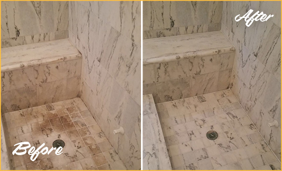 Before and After Picture of a Arroyo Grande Marble Shower Honed to Remove Dark Stains