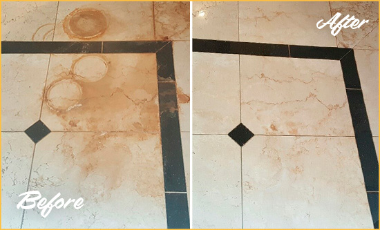 Before and After Picture of a Los Alamos Hard Surface Restoration Service on a Marble Floor to Eliminate Rust Stains